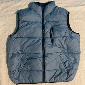 Moose Creek Men's  Blue Puffer reversible Vest size 7
Worn in Great Condition